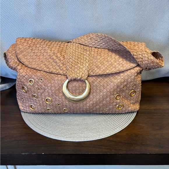 Elliott Luca, tan woven bag with brushed gold grommets and weighted flap close - Picture 1 of 3